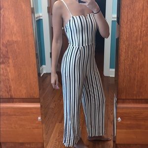 White jumpsuit with navy blue stripes